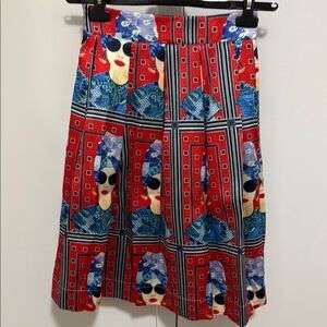 Jaune Rouge Printed Fabric Full Skirt With Novelty Face Print. Size small.
